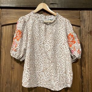 Elegant Women's Blouse with Floral Accents